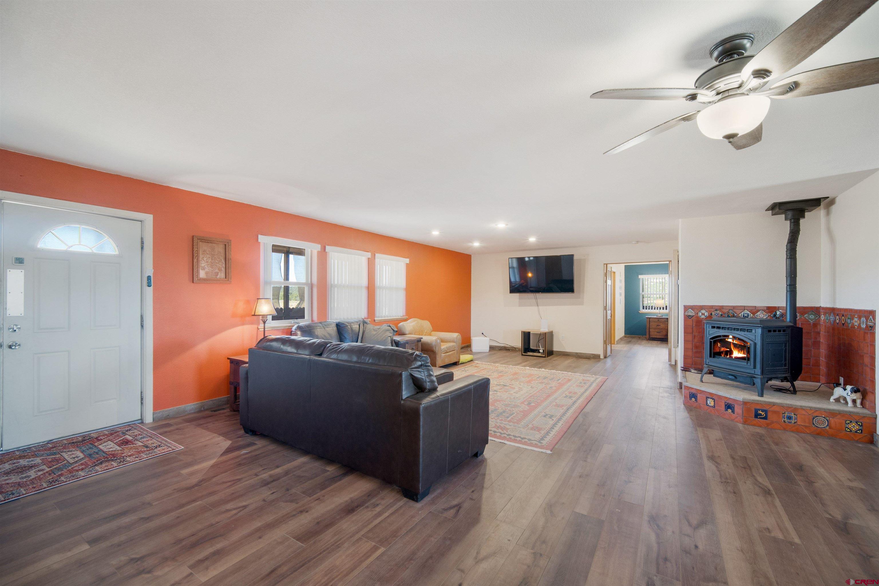 660 Road 8k Egnar, CO 81325 - Photo 8 of 30 a living room with furniture and a flat screen tv