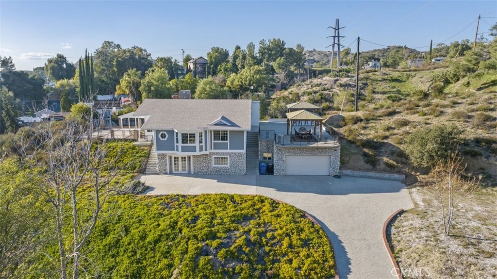 7223 Tranquil Place Tujunga, CA 91042 - Photo 2 of 40 a view of a house with a yard