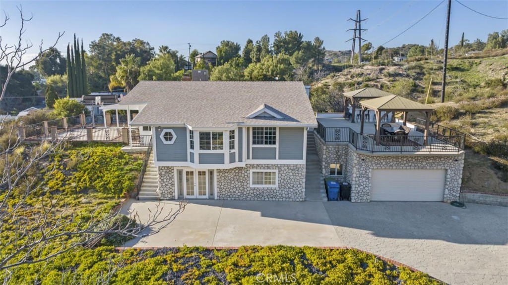 7223 Tranquil Place Tujunga, CA 91042 - Photo 3 of 40 a front view of a house with a garden