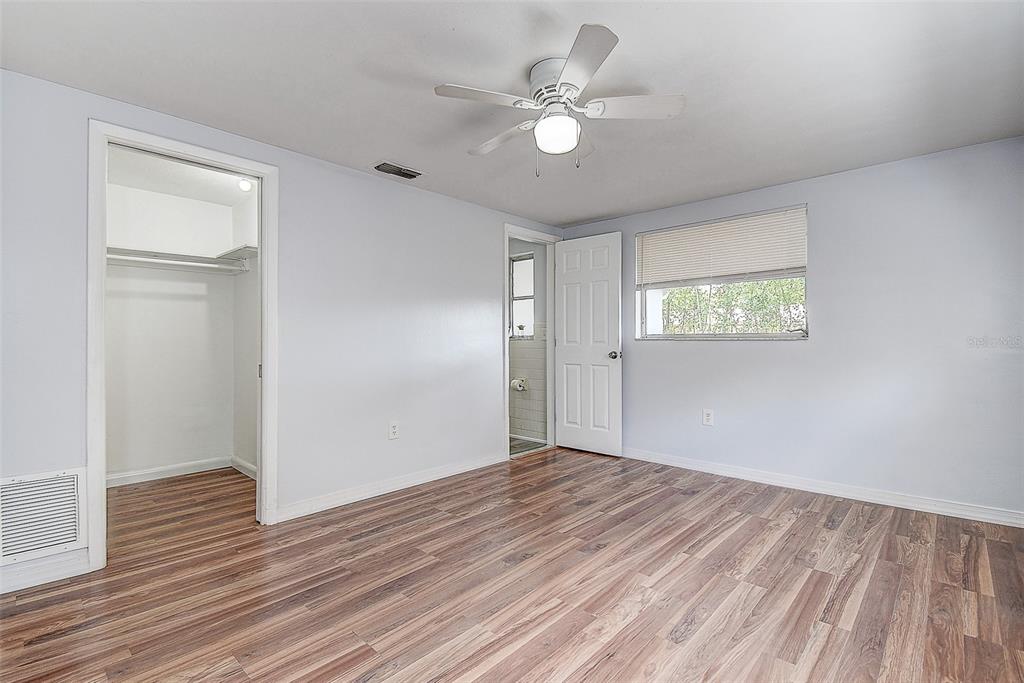7830 Judith Crescent Port Richey, FL 34668 - Photo 16 of 35 Primary Bedroom Walk in Closet