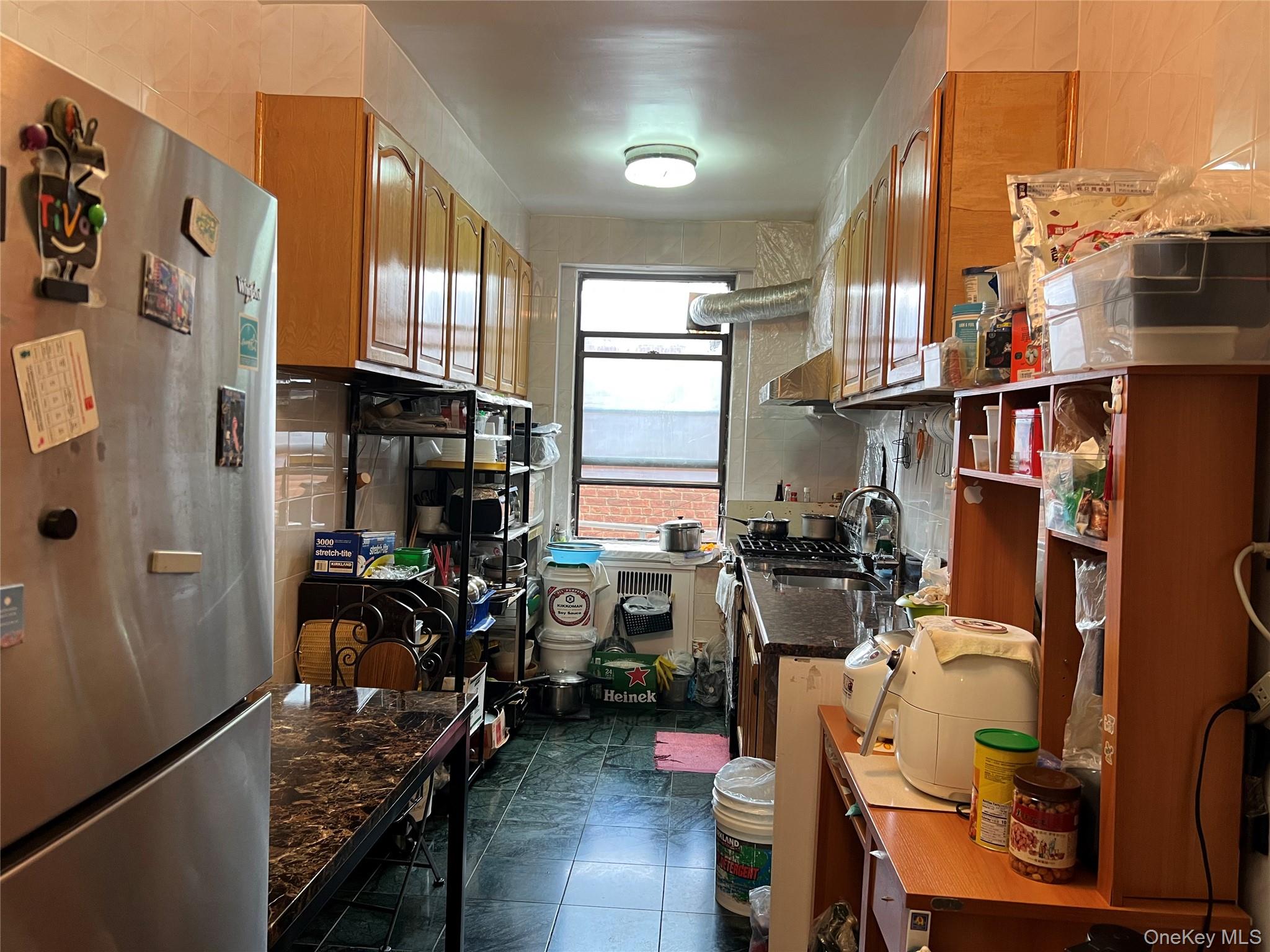 40-35 Ithaca Street, Unit 3D Queens, NY 11373 - Photo 9 of 9 a view of a room with gym equipment