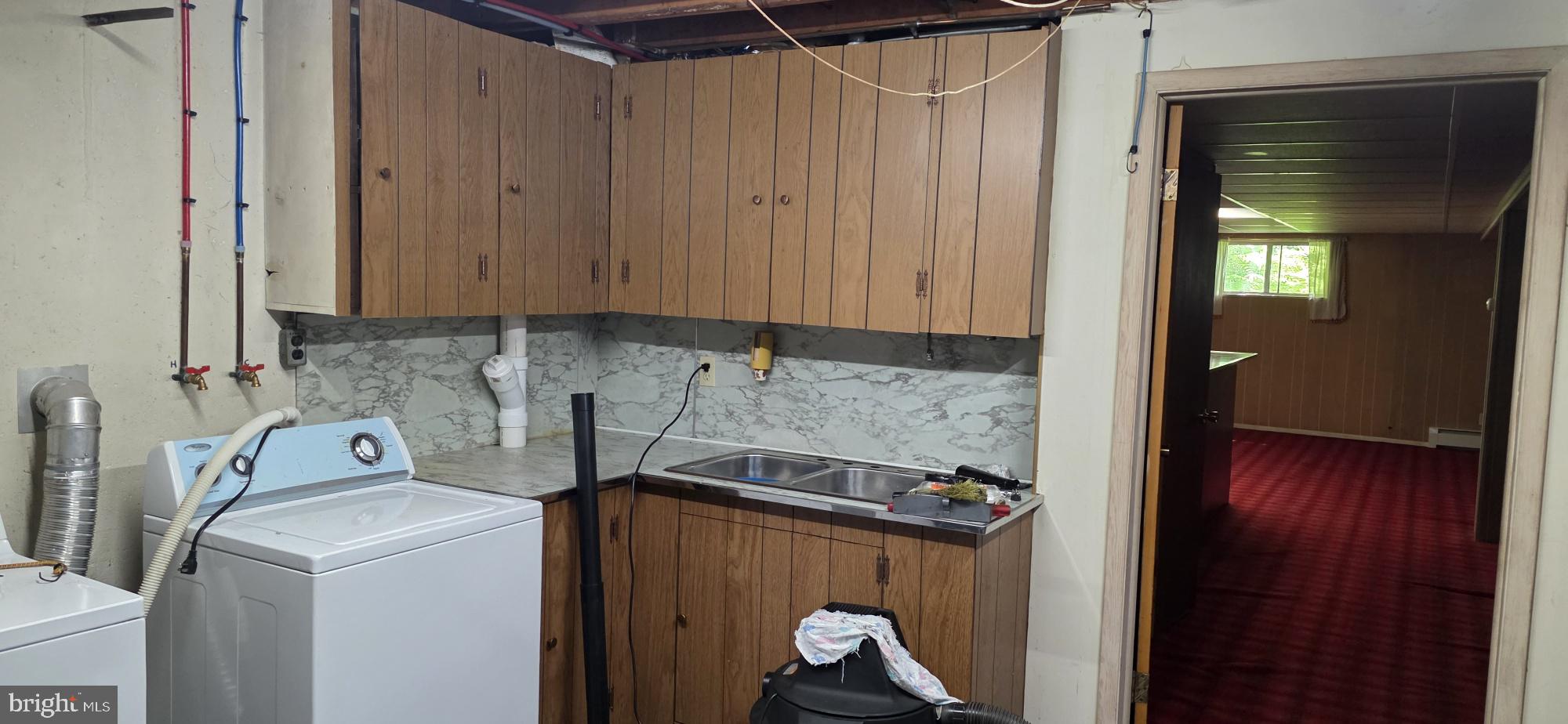 4819 Five Point Road New Tripoli, PA 18066 - Photo 20 of 52 a view of storage and utility room with washer and dryer