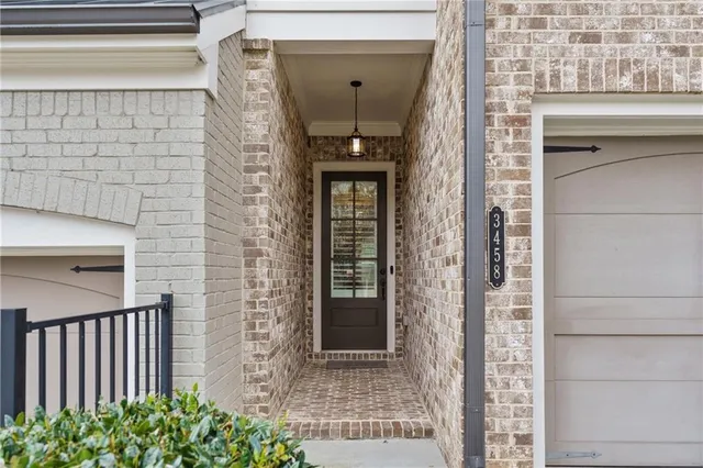 a front view of a house with a glass door