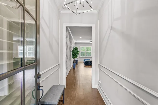 a view of a hallway with seating area