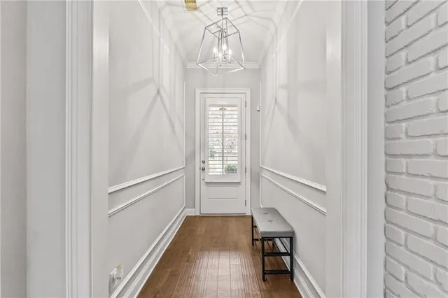 a view of entryway with wooden floor