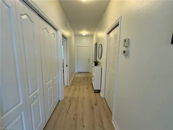 a view of a bathroom from the hallway