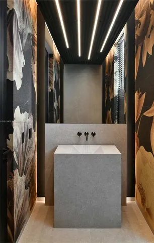 a room that has a large window and garden view