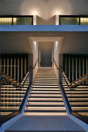 a view of a building with sitting area