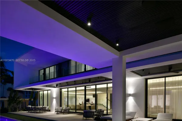 a view of swimming pool with outdoor seating