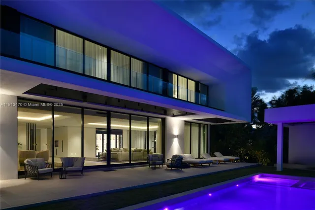 a view of swimming pool with outdoor seating