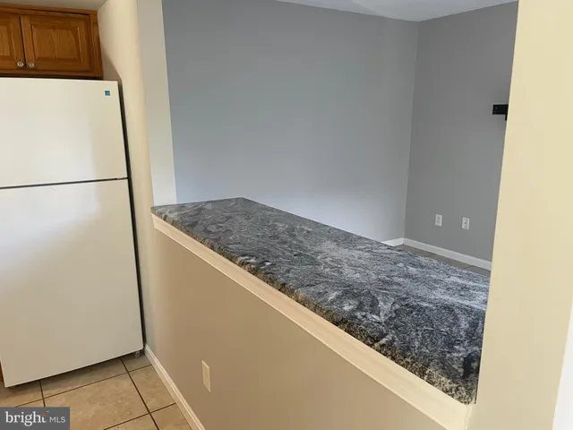 a view of hallway with washer and dryer