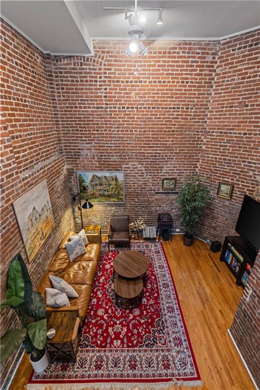 155 3rd Street Northeast, Unit 12 Atlanta, GA 30308 - Photo 14 of 36 a living room with furniture and a rug