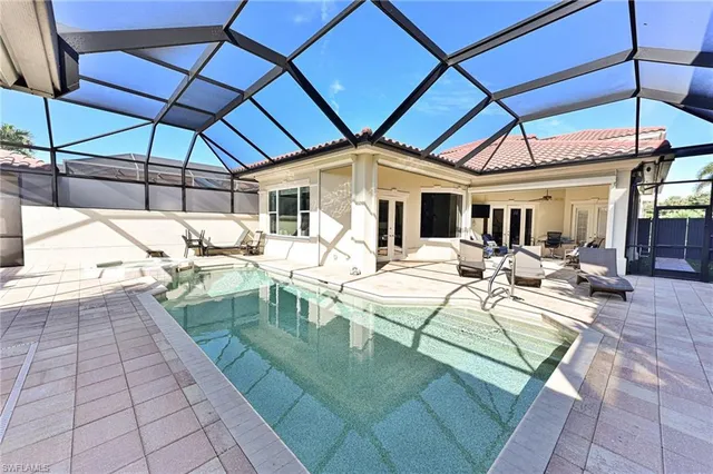 a outdoor space with lots of white furniture