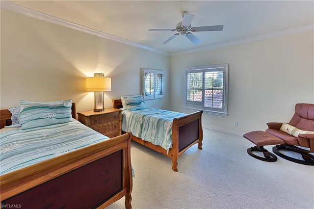 a bathroom with a toilet a sink and a mirror