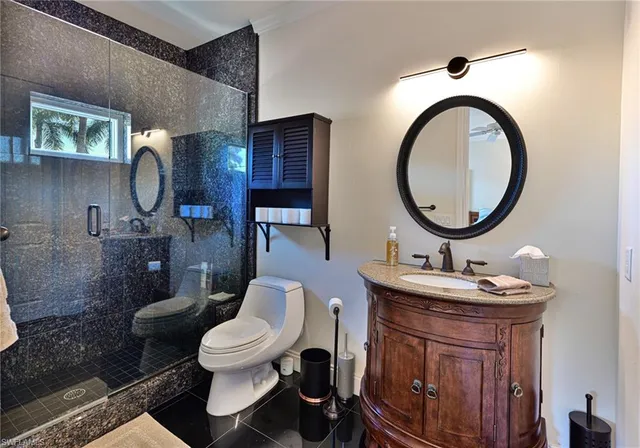 a bathroom with a mirror and a sink