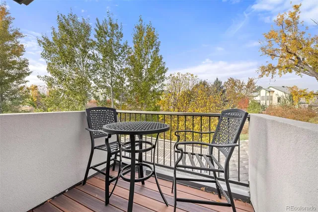 a view of a chairs and table on the terrace