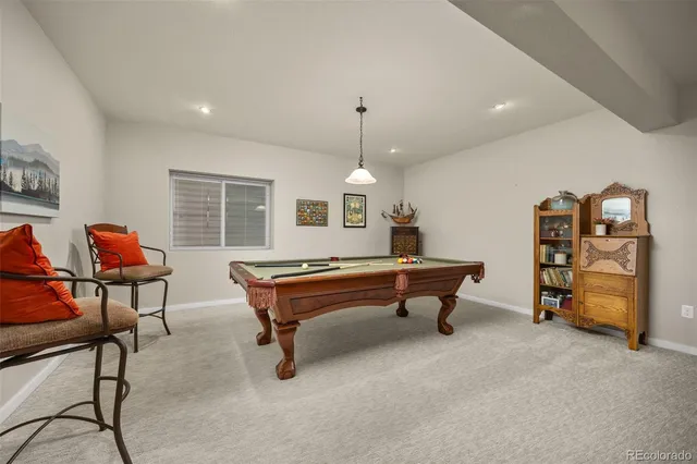 a room with furniture and a wooden floor