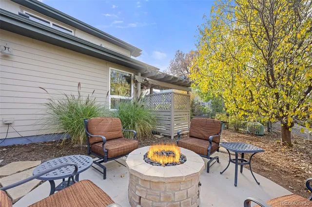a backyard of a house with seating space