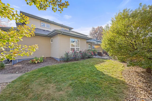 a backyard of a house with seating space