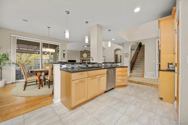 a kitchen with counter top space and appliances