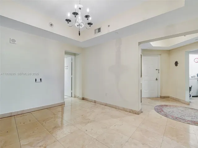 a view of balcony with furniture