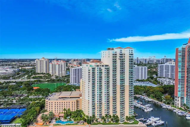 a view of a city with tall buildings