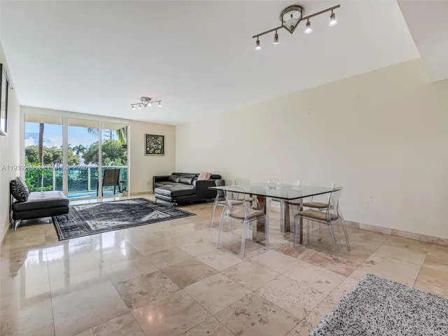 a bathroom with a double vanity sink mirror double and bathtub
