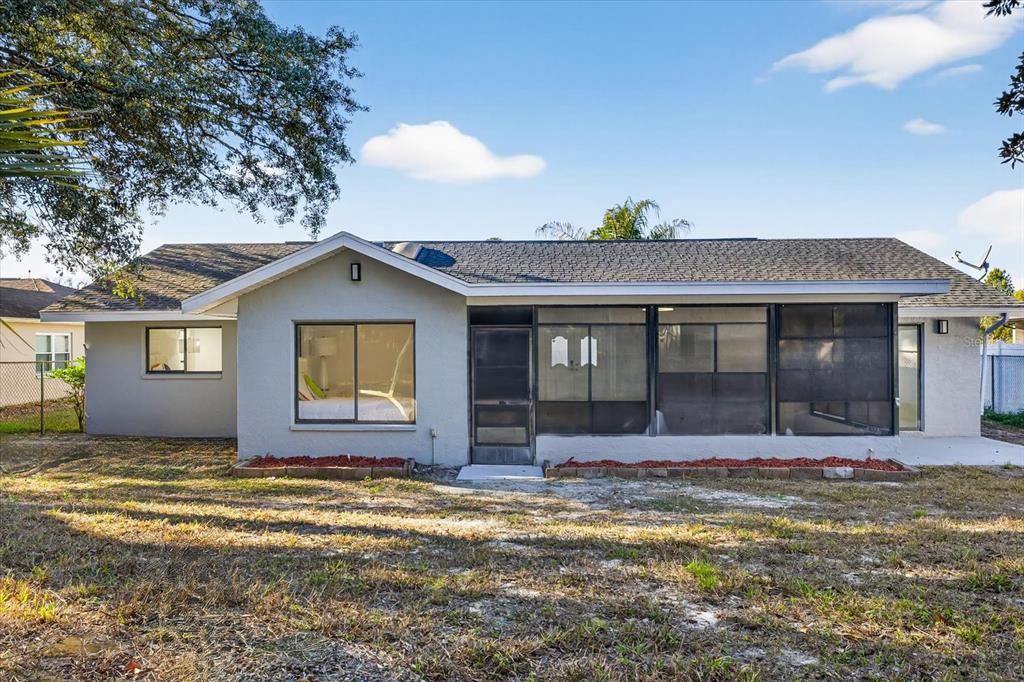 8078 Pagoda Drive Spring Hill, FL 34606 - Photo 45 of 54 a view of an house with backyard space and balcony