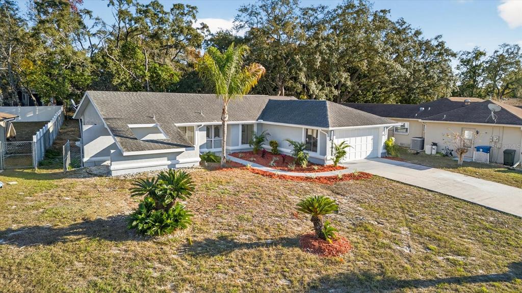 8078 Pagoda Drive Spring Hill, FL 34606 - Photo 48 of 54 a view of swimming pool and lounge chair