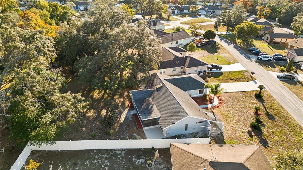 8078 Pagoda Drive Spring Hill, FL 34606 - Photo 53 of 54 an aerial view of residential houses with outdoor space