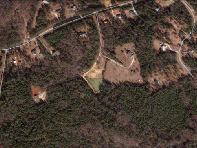 739 Taylor Road, Unit A12 Juliette, GA 31046 - Photo 1 of 1 a view of a house with a yard