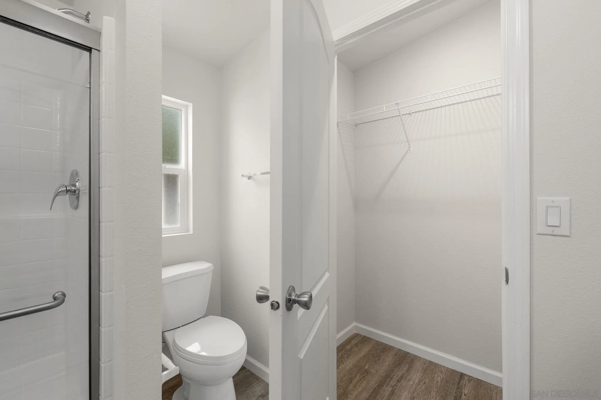 22899 Byron Road, Unit SPC 92 Crestline, CA 92325 - Photo 13 of 28 a white toilet sitting next to a bathroom sink