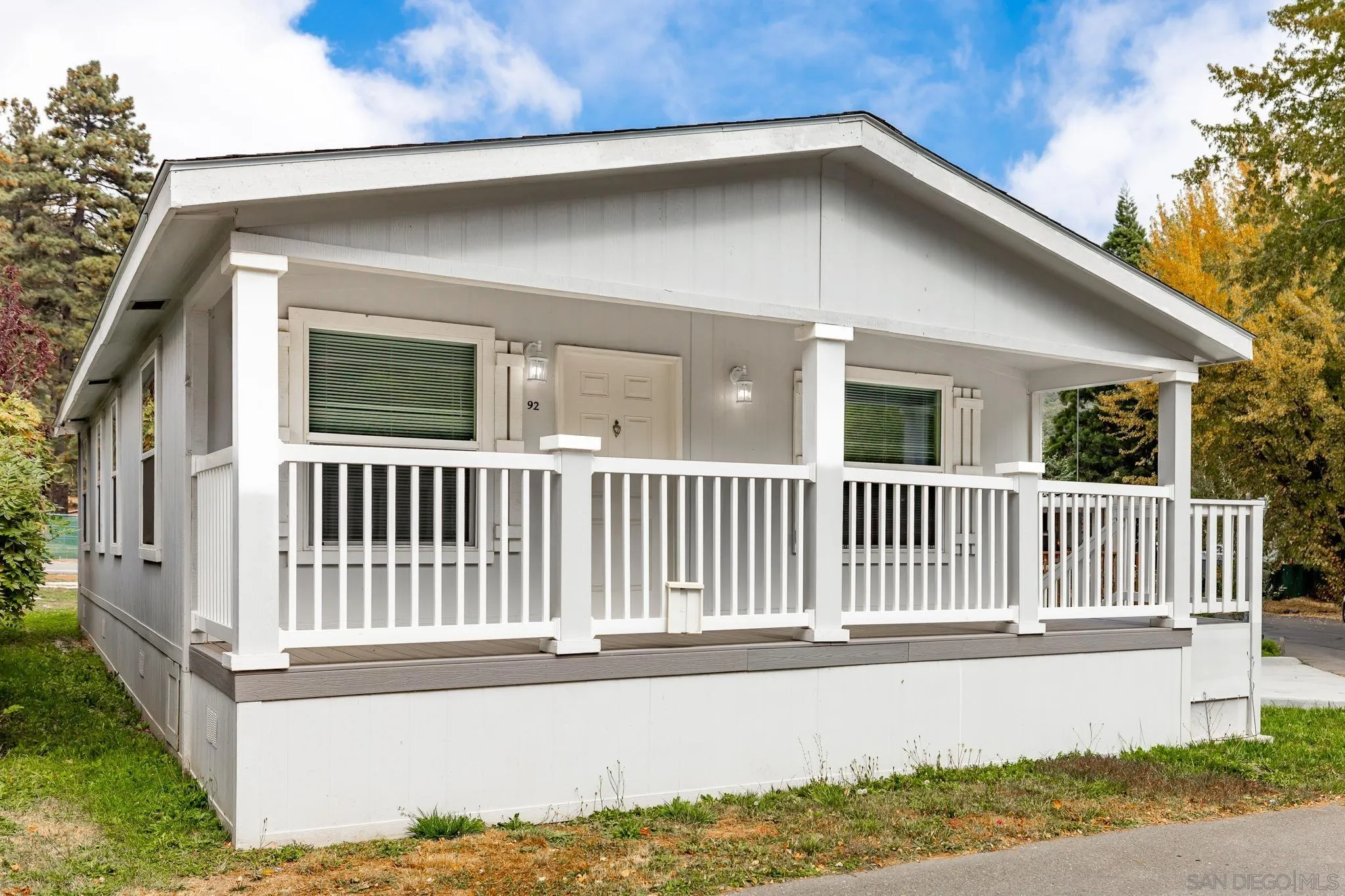 22899 Byron Road, Unit SPC 92 Crestline, CA 92325 - Photo 22 of 28 a view of a house with a porch