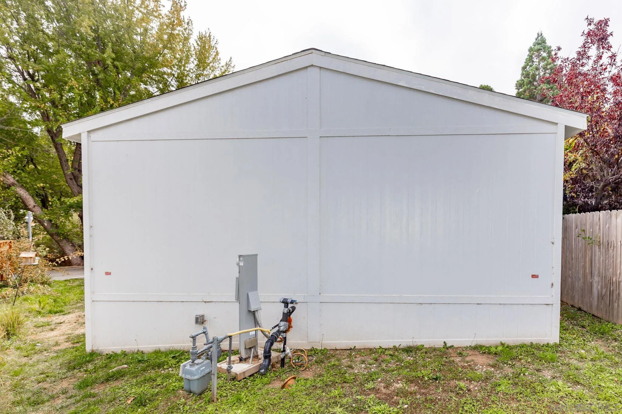 22899 Byron Road, Unit SPC 92 Crestline, CA 92325 - Photo 27 of 28 a backyard of a house