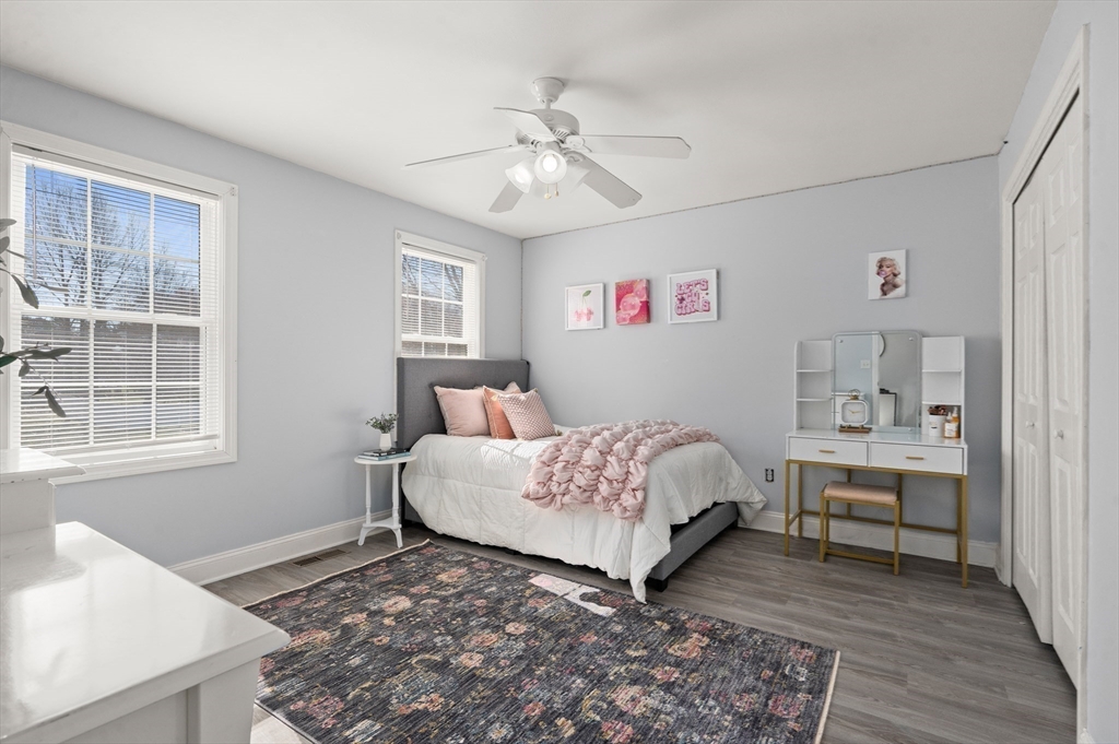 104 Overlook Terrace Dracut, MA 01826 - Photo 29 of 39 a bedroom with a bed and a window