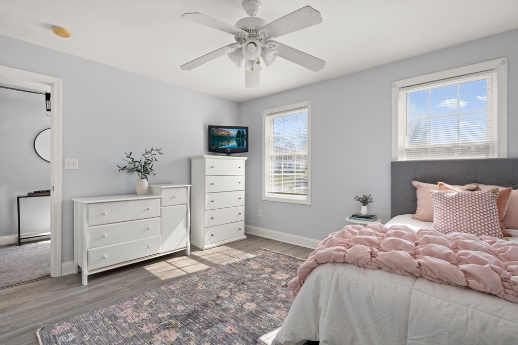 104 Overlook Terrace Dracut, MA 01826 - Photo 30 of 39 a bedroom with a bed and a window