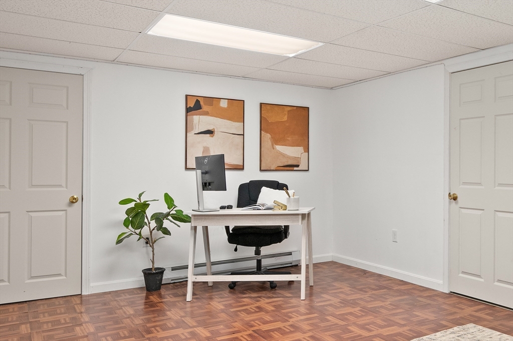 104 Overlook Terrace Dracut, MA 01826 - Photo 35 of 39 a workspace with furniture and a potted plant