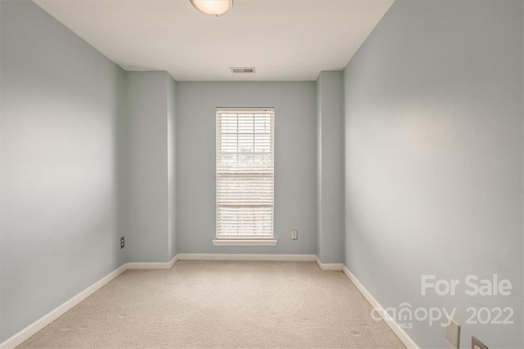 2126 Midnight Blue Lane Fort Mill, SC 29708 - Photo 26 of 35 an empty room with windows