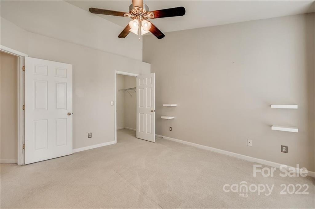 2126 Midnight Blue Lane Fort Mill, SC 29708 - Photo 30 of 35 an empty room with chandelier fan