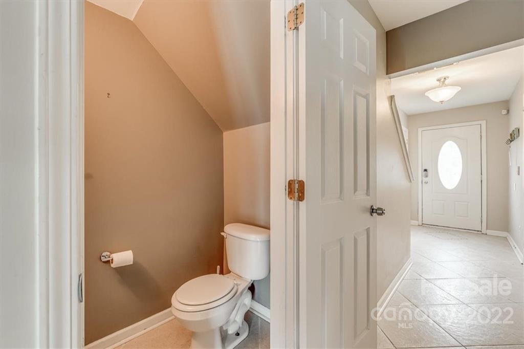 2126 Midnight Blue Lane Fort Mill, SC 29708 - Photo 5 of 35 a bathroom with a toilet and a shower
