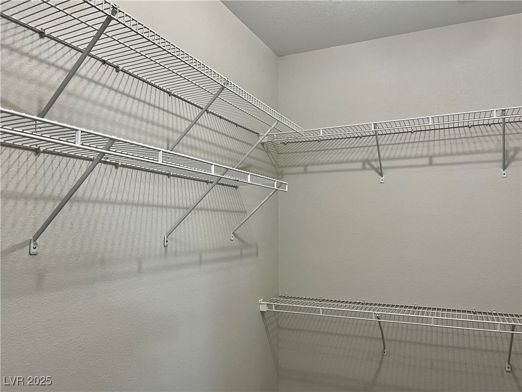231 Spectacular Street Henderson, NV 89052 - Photo 33 of 66 Primary bedroom walk in closet