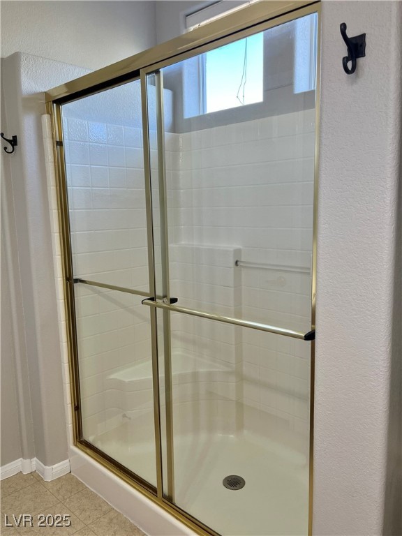 231 Spectacular Street Henderson, NV 89052 - Photo 38 of 66 Primary bath with double sinks, oak cabinets, cultured marble countertop, walk in shower & linen closet