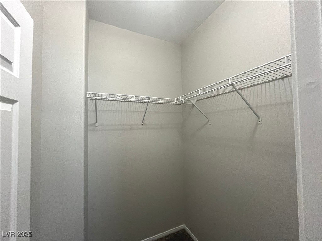 231 Spectacular Street Henderson, NV 89052 - Photo 43 of 66 Bed 2 with walk in closet