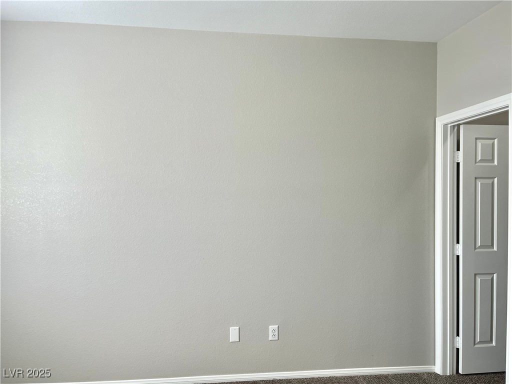 231 Spectacular Street Henderson, NV 89052 - Photo 50 of 66 Bed 3 with ceiling light, carpet, walk in closet and Jack and Jill bathroom