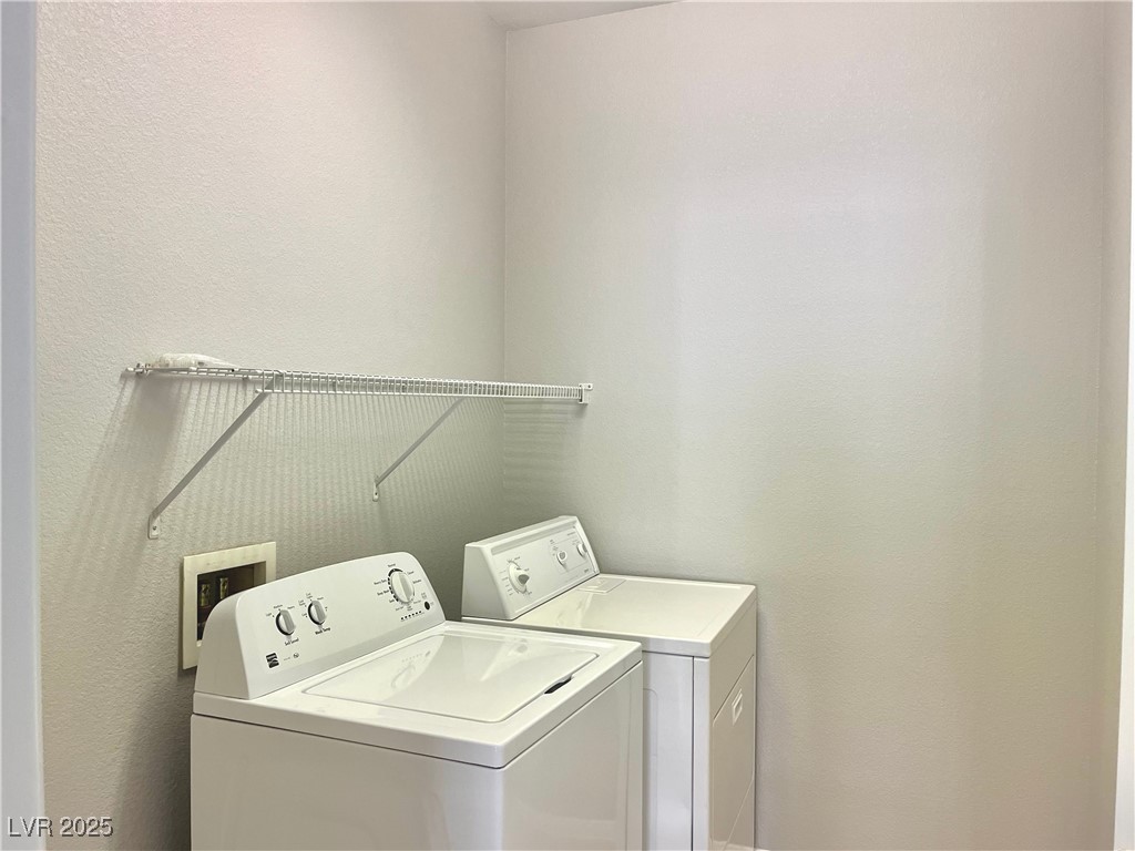 231 Spectacular Street Henderson, NV 89052 - Photo 57 of 66 Laundry room upstairs with wire shelves