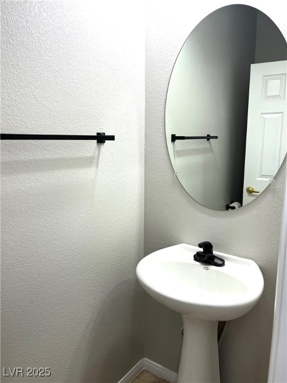 231 Spectacular Street Henderson, NV 89052 - Photo 60 of 66 Guest bath downstairs with pedestal sink