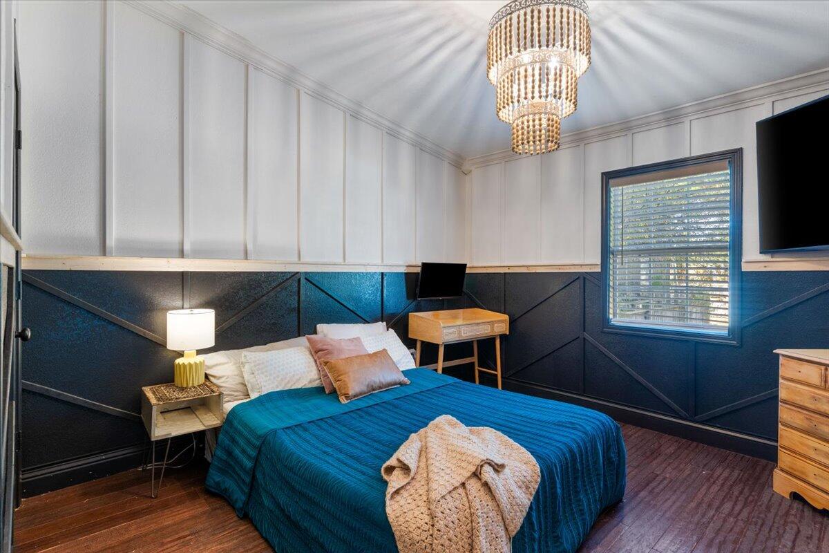 3562 Bob Tolbert Road Navarre, FL 32566 - Photo 22 of 55 a bedroom with bed and a window