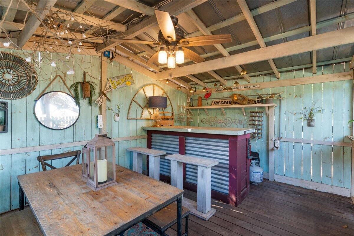 3562 Bob Tolbert Road Navarre, FL 32566 - Photo 29 of 55 a view of a dining room with furniture