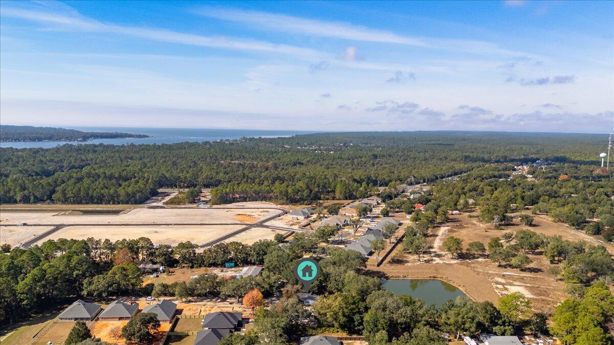 3562 Bob Tolbert Road Navarre, FL 32566 - Photo 55 of 55 an aerial view of a city