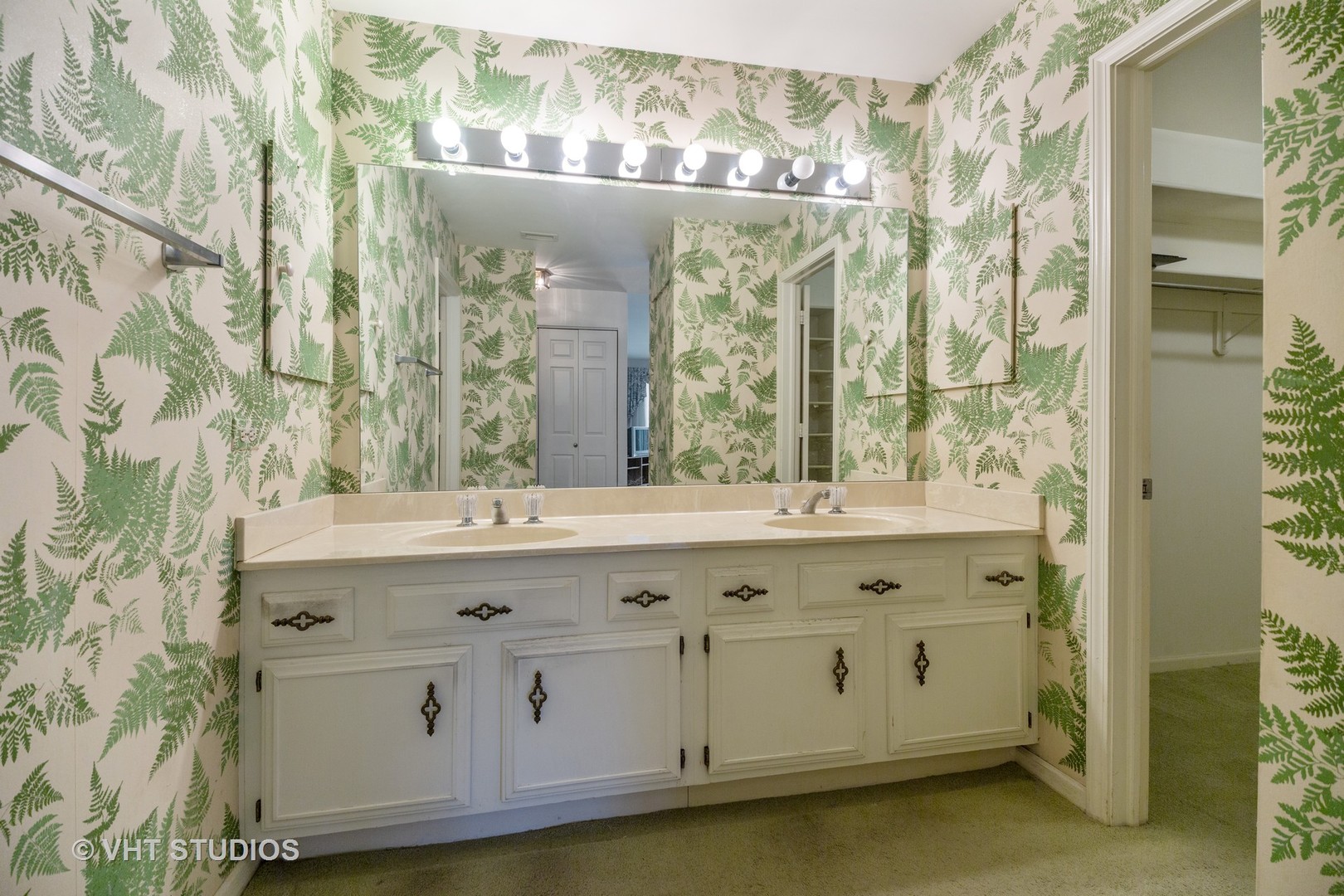 1800 Mission Hills Road, Unit 210 Northbrook, IL 60062 - Photo 13 of 16 a bathroom with a sink and a mirror